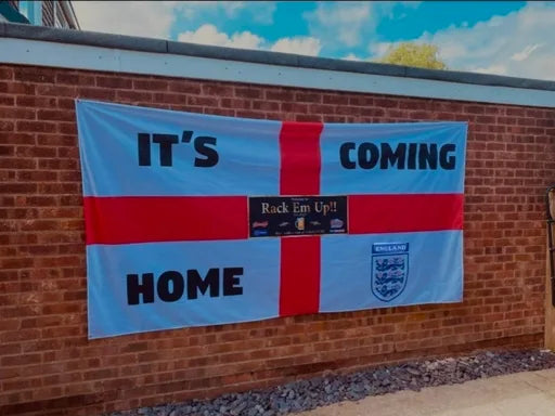 Personalised England flag with Rack Em Up design displayed on a brick wall